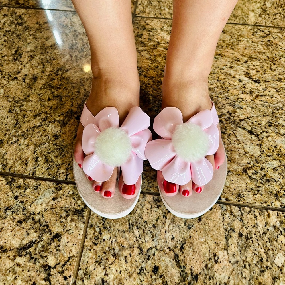 UGG floral Pink Pom Pom flip flops! Size 11